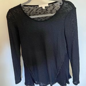 Black lightweight sweater with embroidered pattern on the bottom
